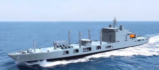 The image shows a rendering of a new fleet support ship being built for the Indian Navy.